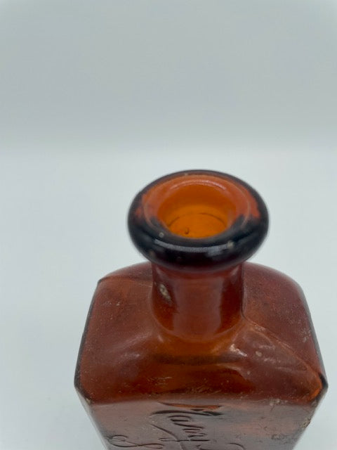 Pharmacist's Embossed Brown Medicine Bottle (Item 0361)